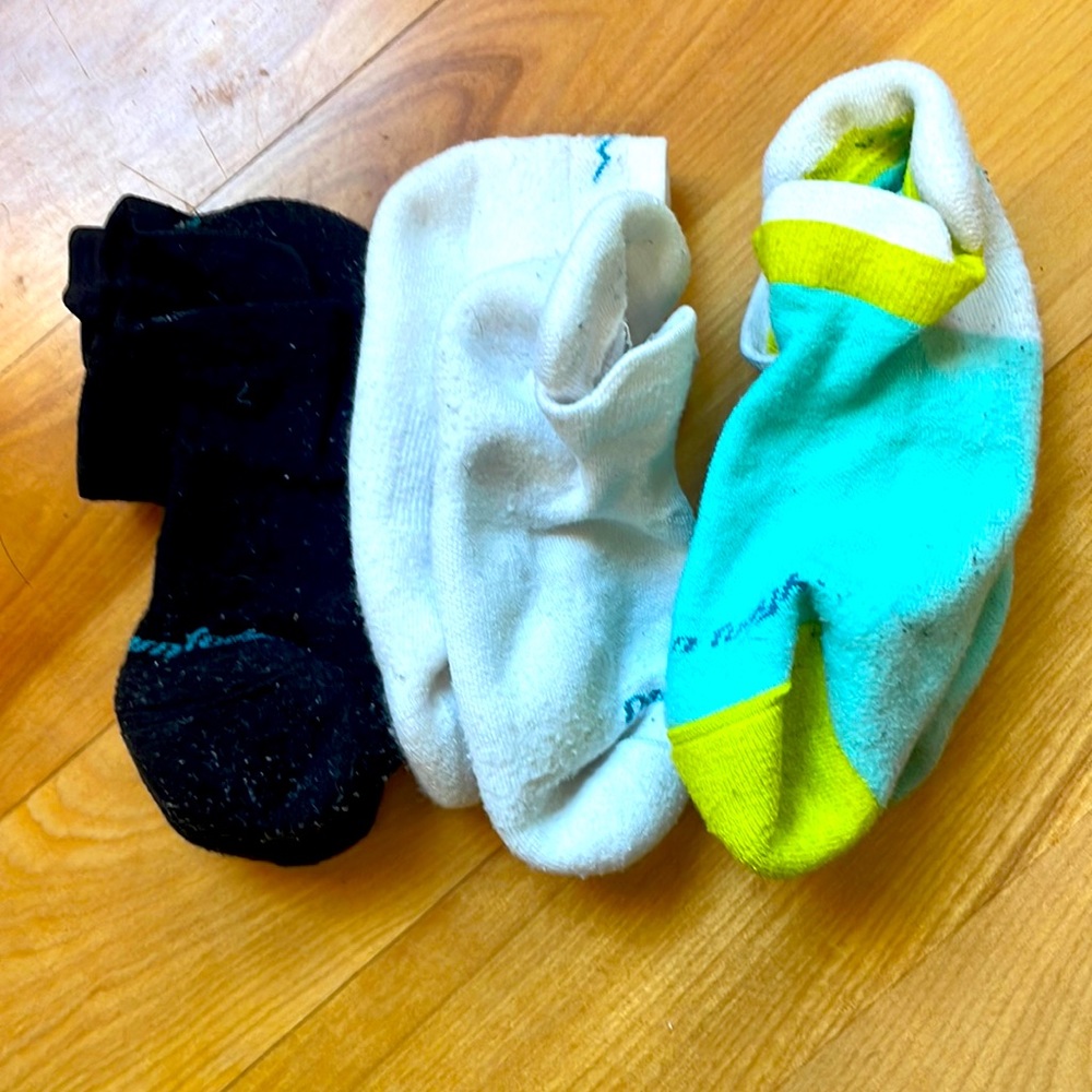 3 pairs of Darn Tough no show, cushioned socks.